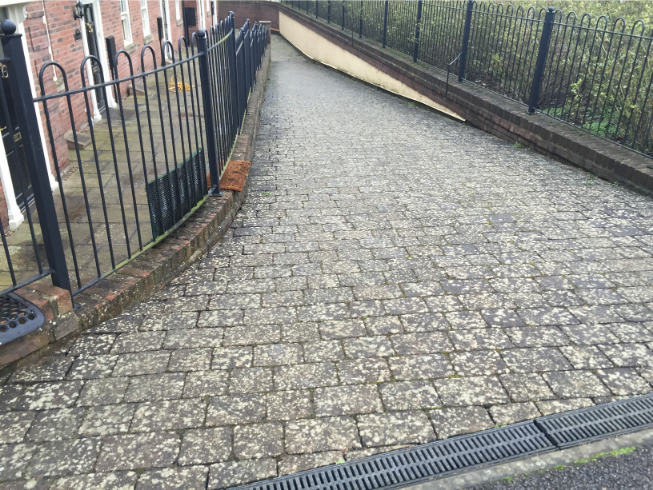 Dirty driveway before professional cleaning by the best exterior cleaning company