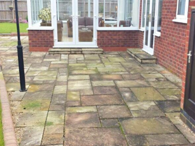 Dirty patio before professional cleaning by the best exterior cleaning company