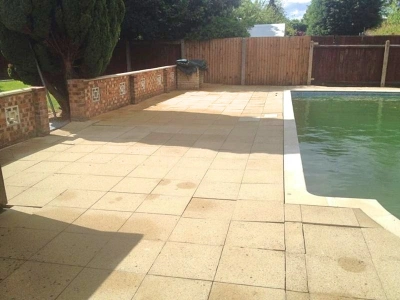 Clean swimming pool surround after professional cleaning